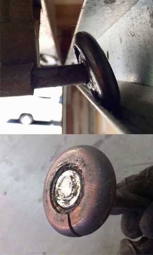 broken garage door roller